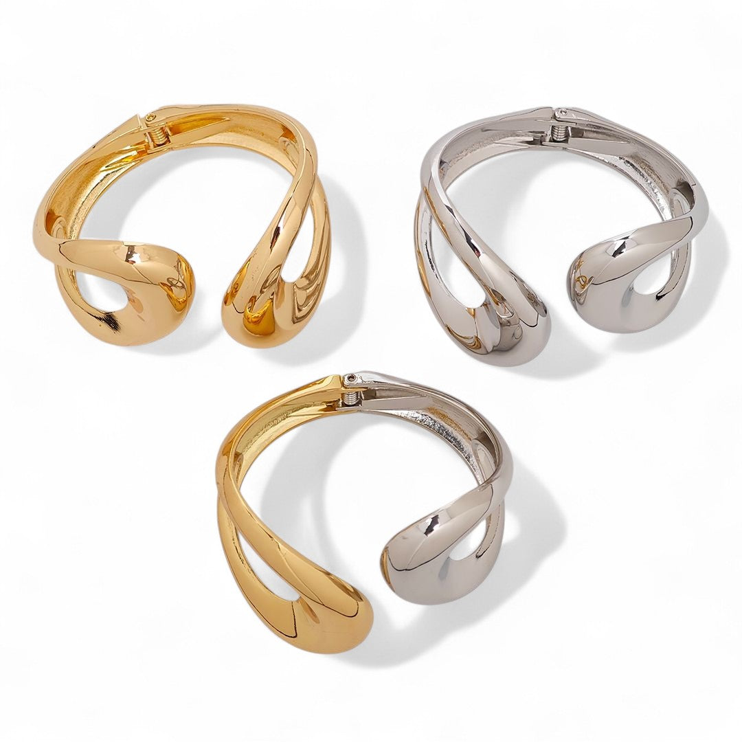 Sculptural twisted cuff bracelet σε χρυσό, ασημί & δίχρωμο – wholesale So Cute by Dimi