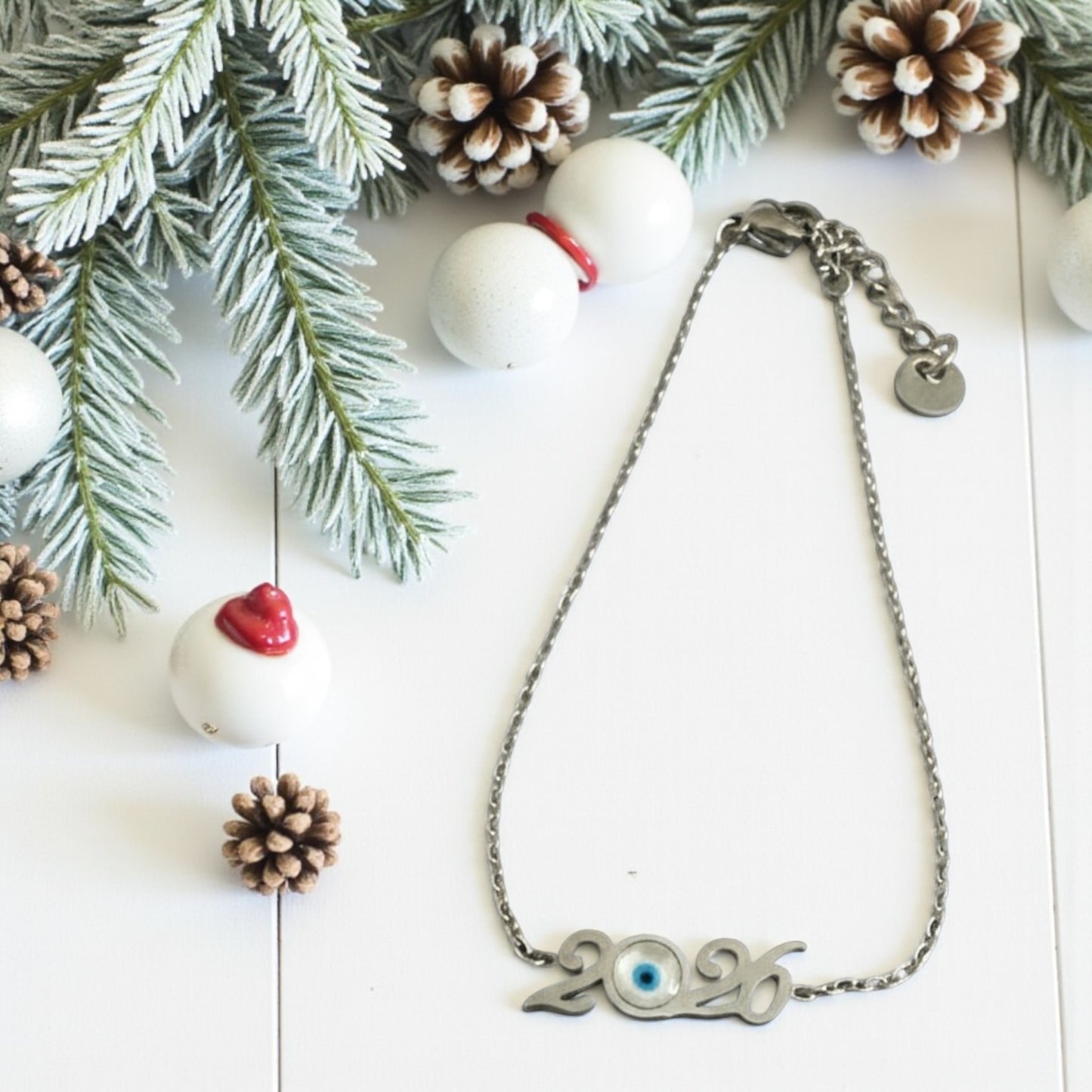 Ατσάλινο βραχιόλι γούρι 2026 με ματάκι σε χρυσό και ασημί – So Cute Wholesale