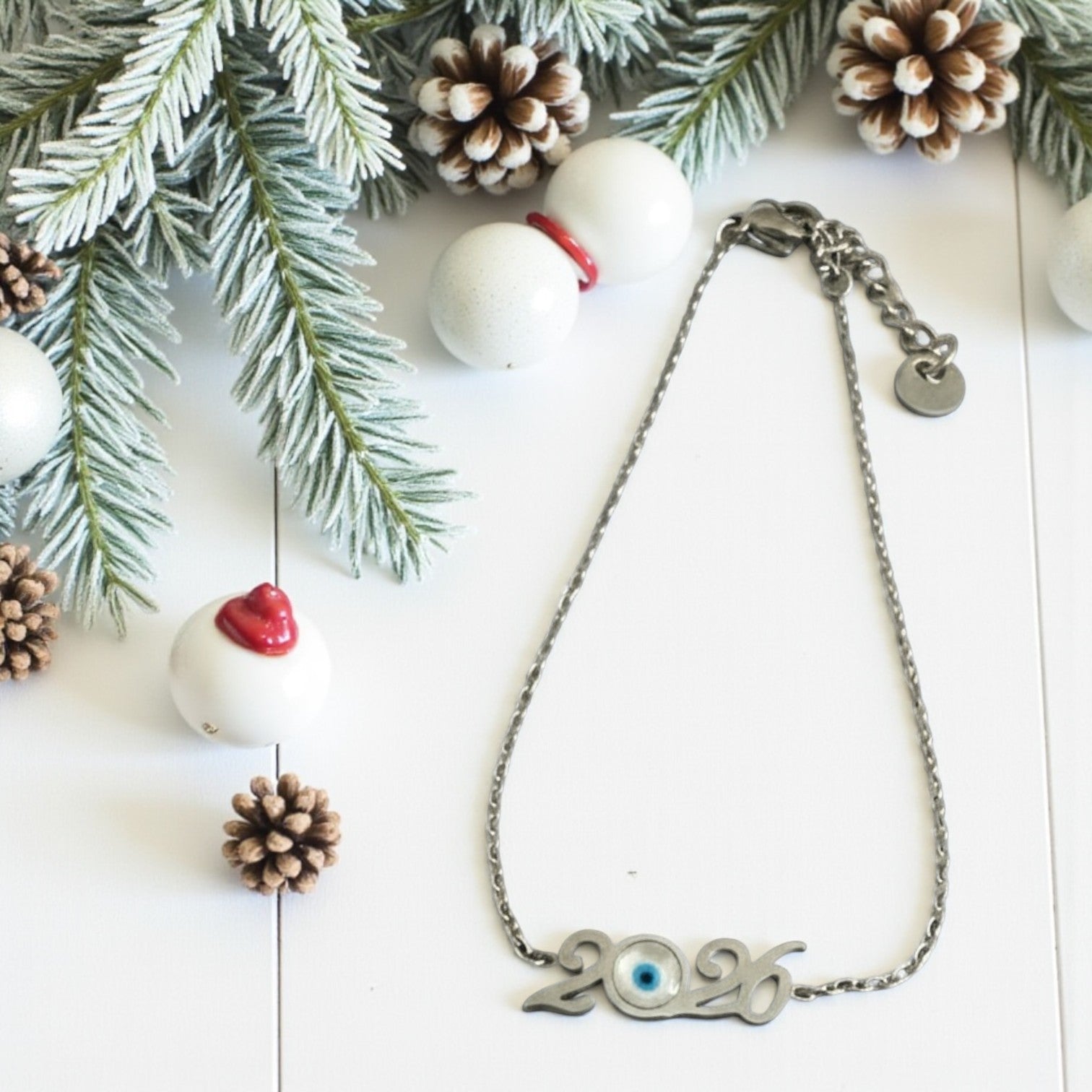 Ατσάλινο βραχιόλι γούρι 2026 με ματάκι σε χρυσό και ασημί – So Cute Wholesale