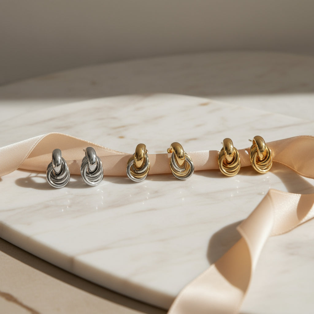 Ατσάλινα σκουλαρίκια με σχέδιο κόμπου – So Cute by Dimi χονδρική