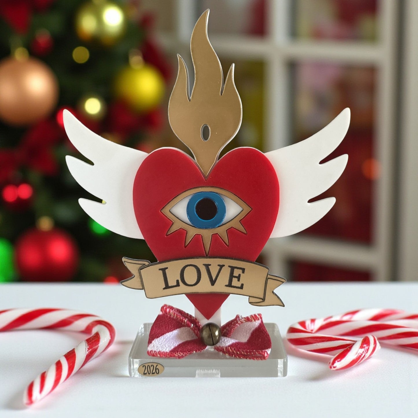 Χονδρικό επιτραπέζιο γούρι Christmas Pop Love Heart από plexiglass με μάτι, φλόγα & φτερά – So Cute by Dimi