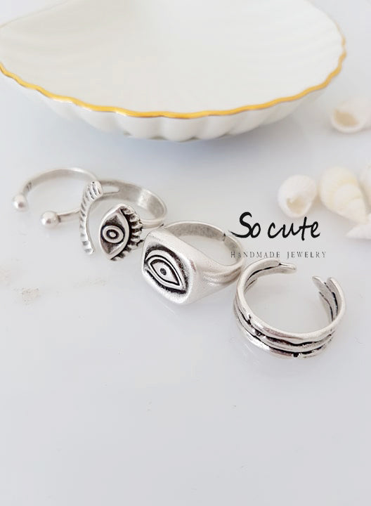 Evil eye ring with eyelashes in a package of 4 pieces