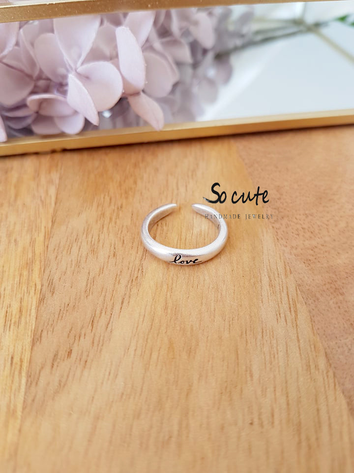 “Love” ring in a package of 3 pieces