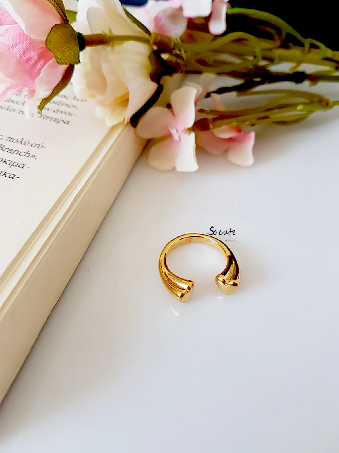 Ring with heart ending in a package of 4 pieces