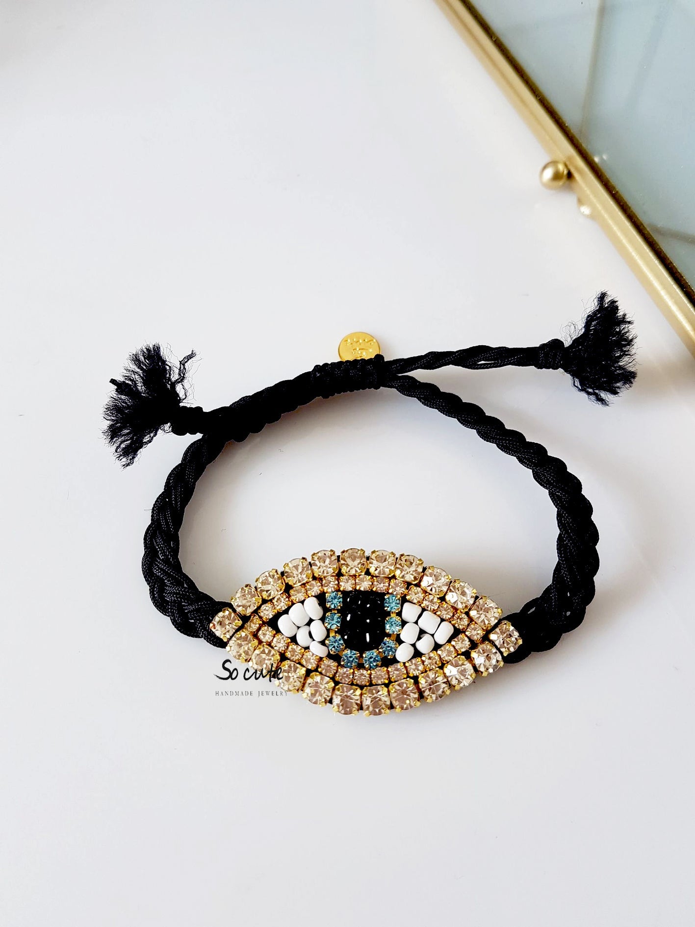 Χειροποίητο βραχιόλι με πλεκτό κορδόνι και μεγάλο μοτίφ ματιού με στρας – Shiny Eye Medium – So Cute by Dimi