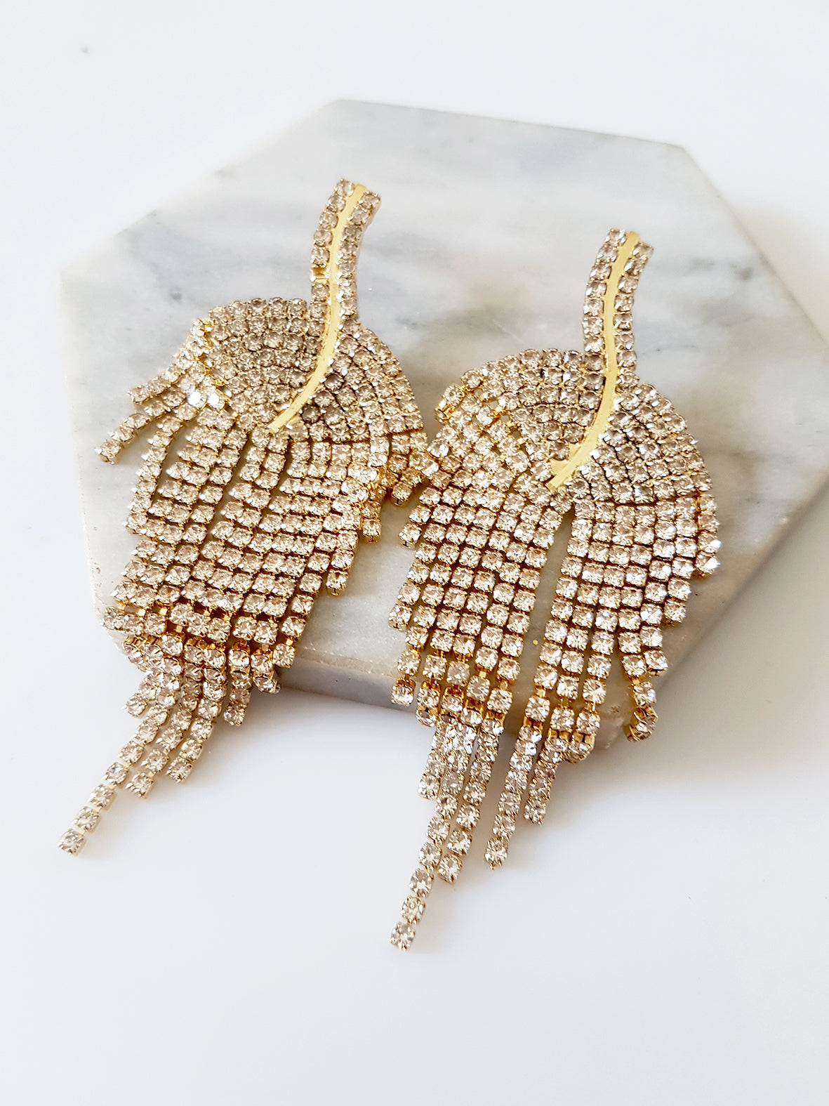 Dangling curved rhinestone earrings - SoCuteb2b